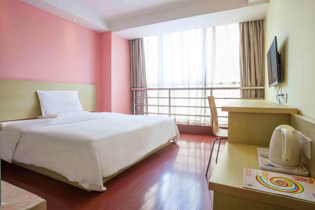 7 Days Inn Meizhou Jiangnan Kedu Commercial Plaza Quarto foto