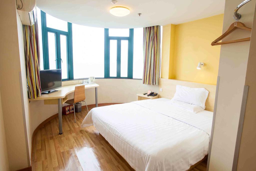 7 Days Inn Meizhou Jiangnan Kedu Commercial Plaza Quarto foto