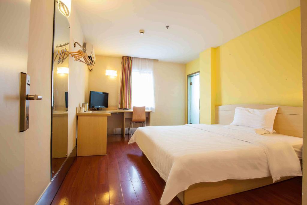 7 Days Inn Meizhou Jiangnan Kedu Commercial Plaza Quarto foto